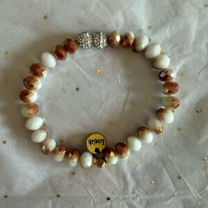 Elegant Beaded Bracelet with Gold Charm
